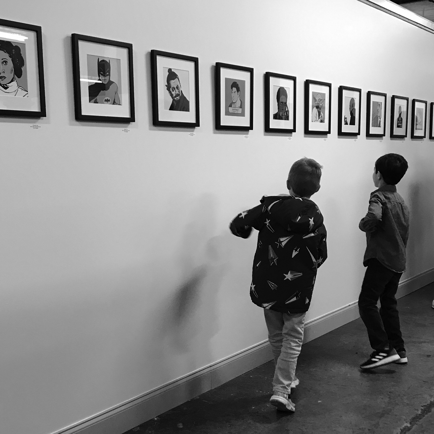 Young patrons observing art