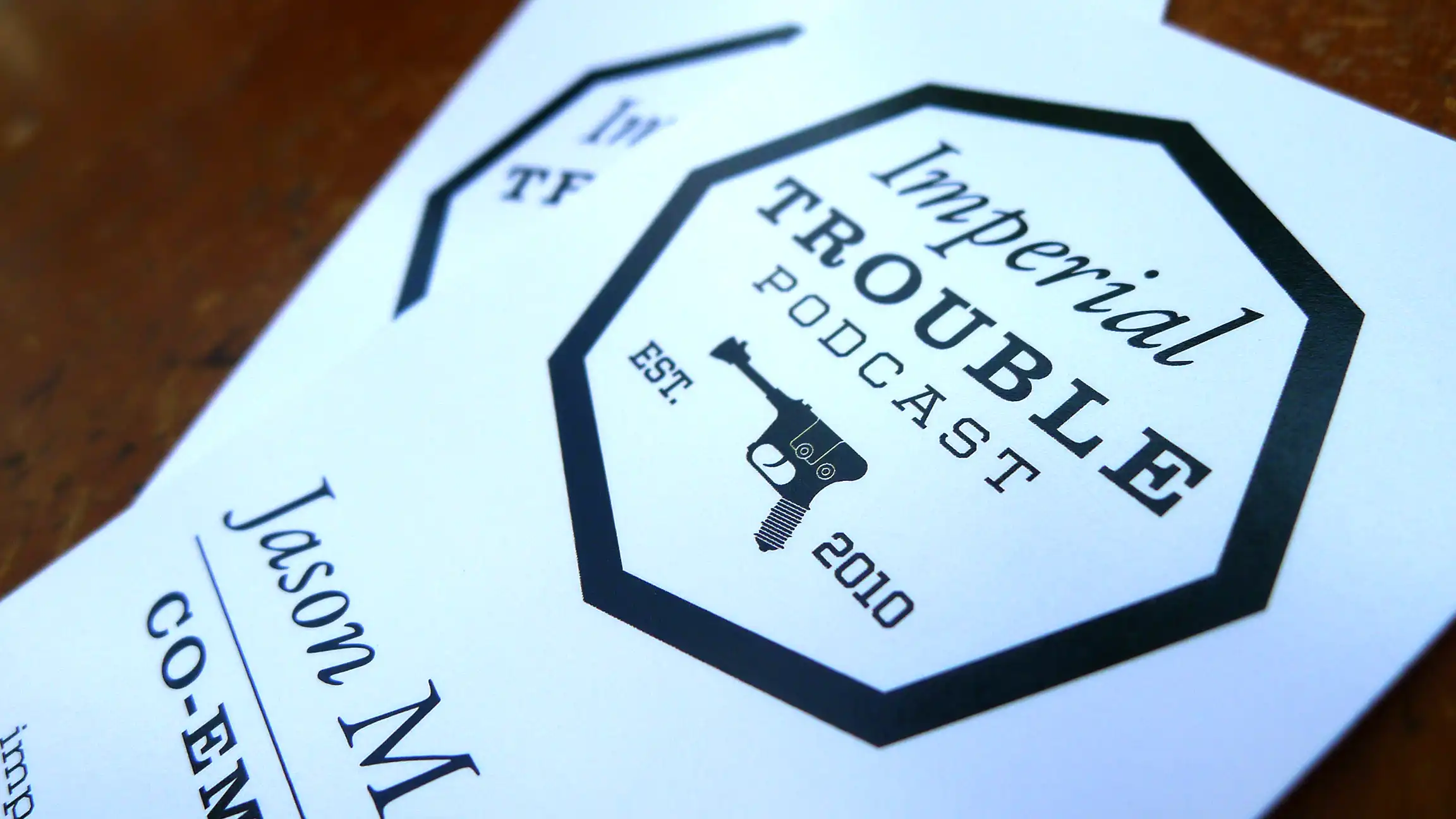 Closeup Image of Imperial Trouble logo on Business Card Closeup Image of Imperial Trouble logo on Business Card
